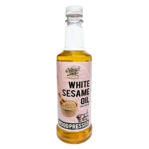 Naturecure Wood Pressed White Sesame Oil 500ml bottle front view
