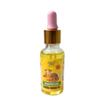 Naturecure wood pressed mamra badam oil 30ml glass dropper bottle with almonds on wooden background