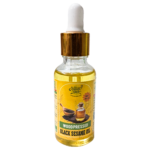Naturecure wood pressed black sesame oil 30ml glass dropper bottle isolated on white background