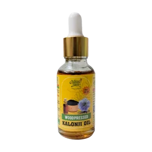 Naturecure wood pressed kalonji oil 30ml glass dropper bottle isolated on white background