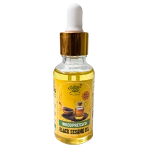 Naturecure wood pressed black sesame oil 30ml glass dropper bottle isolated on white background